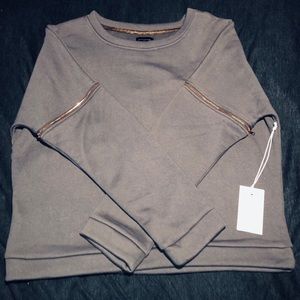 A lime and vine brand sweater.